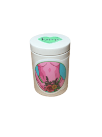 a pink jar with a flower on it